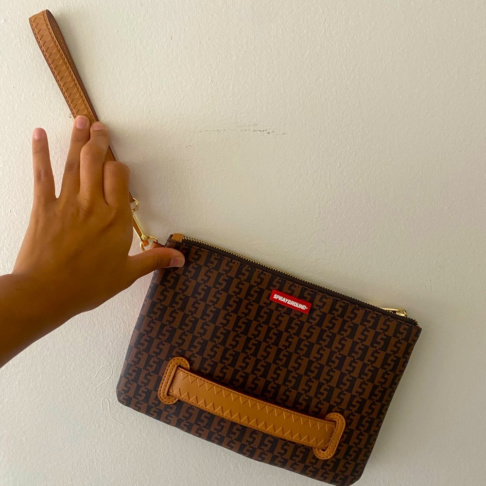 Brand new sprayground clutch